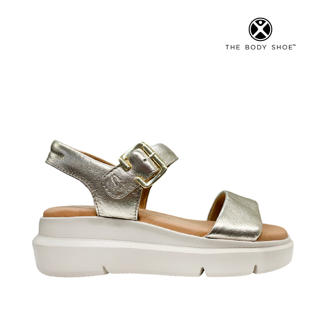 Sandalias flats Uplift QTR para mujer color dorado